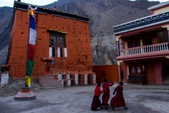 little monks playing in the courtyard of the monastery in Kagbeni