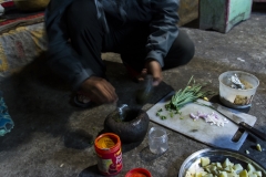 Ujjwal preparing pickles based on his secret recipy with chili powder and fresh mint leaves - was delicious!